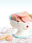Sugar Cookies with Pink Frosting and Sprinkles