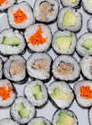 Sushi selection on a white plate